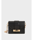 Venta de Cartera crossbody Charles & Keith color Negro con detalles metálicos en Panamá. A sólo $25. Entrega gratis. Garantía Mercologo.