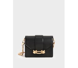 Venta de Cartera crossbody Charles & Keith color Negro con detalles metálicos en Panamá. A sólo $25. Entrega gratis. Garantía Mercologo.